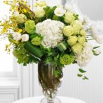 white roses green and white hydrangeas and white orchids yellow flowers luxury flowers florist