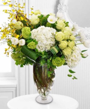 white roses green and white hydrangeas and white orchids yellow flowers luxury flowers florist